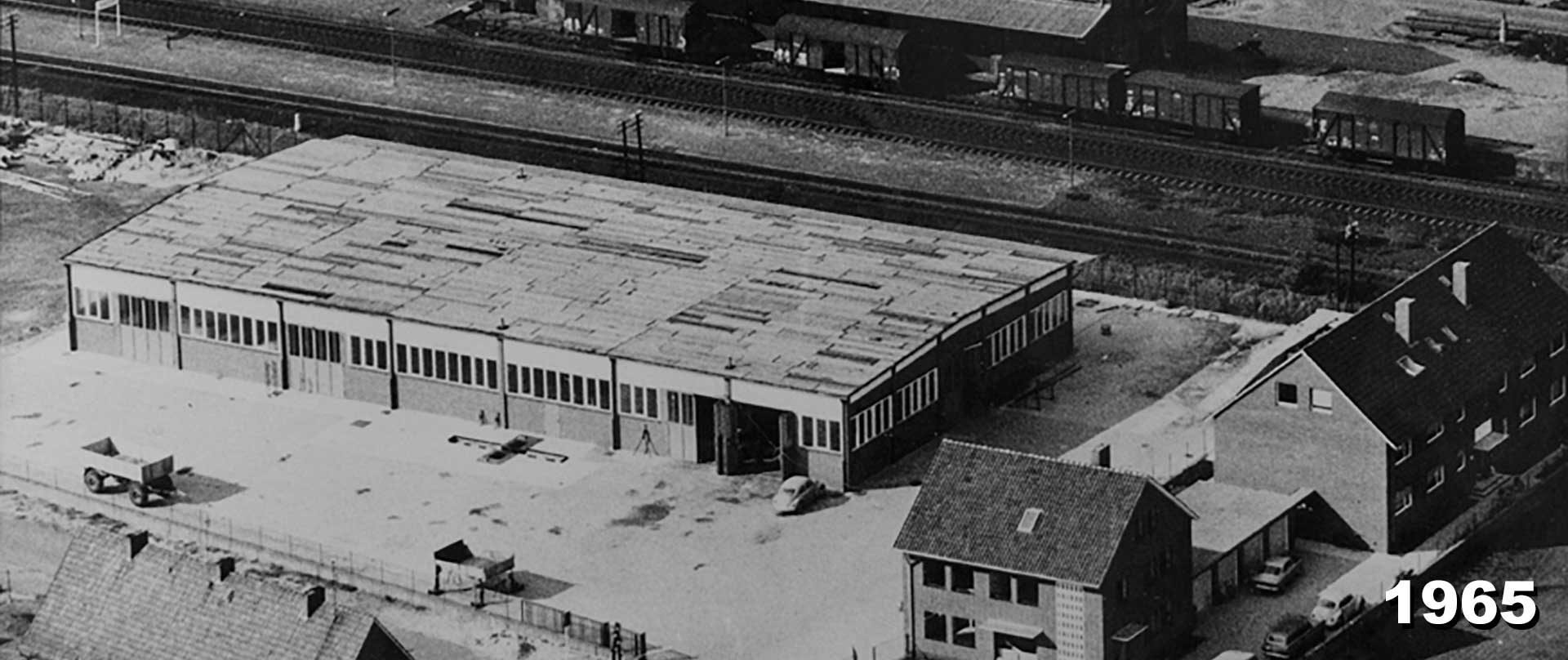 Historische Luftaufnahme der ursprünglichen Betriebsstätte der Familie Wessels in Schüttorf, 1965